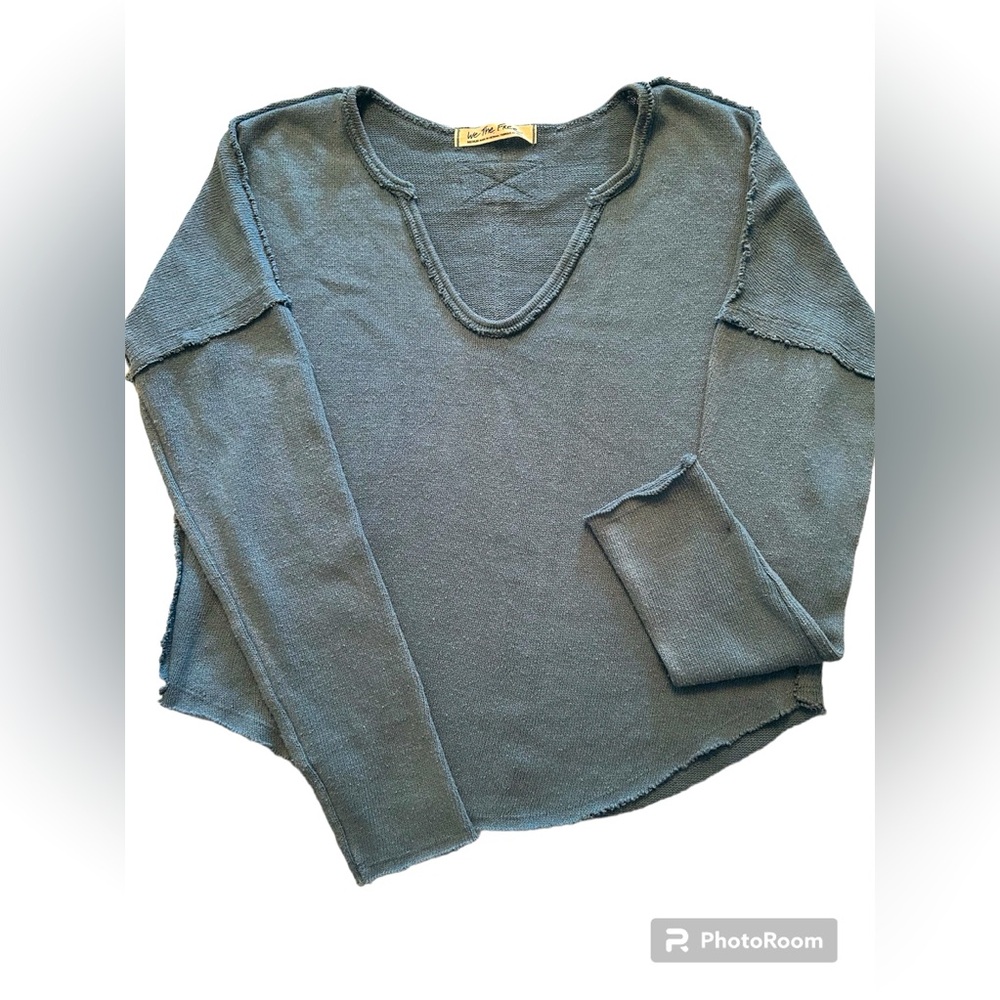 Free People light, soft sweater. Falls just about at waist; a bit oversized.